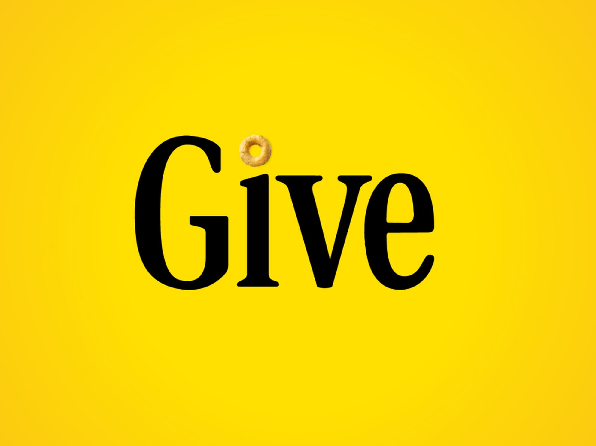 Give with a Cheerio over the i